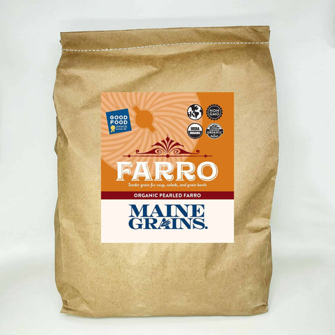 A 25# bulk bag of pearled farro in a kraft paper bag.