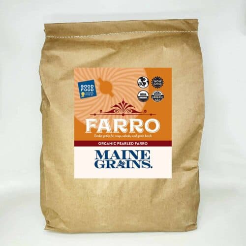 A 25# bulk bag of pearled farro in a kraft paper bag.