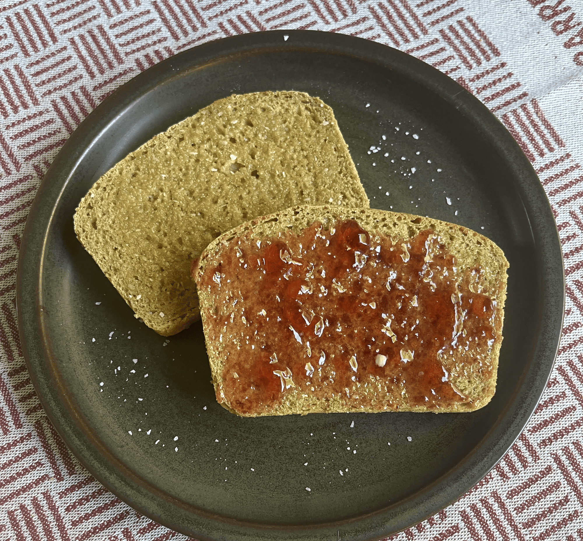 Toasted einkorn bread with butter and jam
